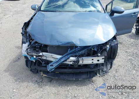 2021 Toyota Corolla Le z USA, uszkodzony, nr VIN JTDEPMAE7MJ144664